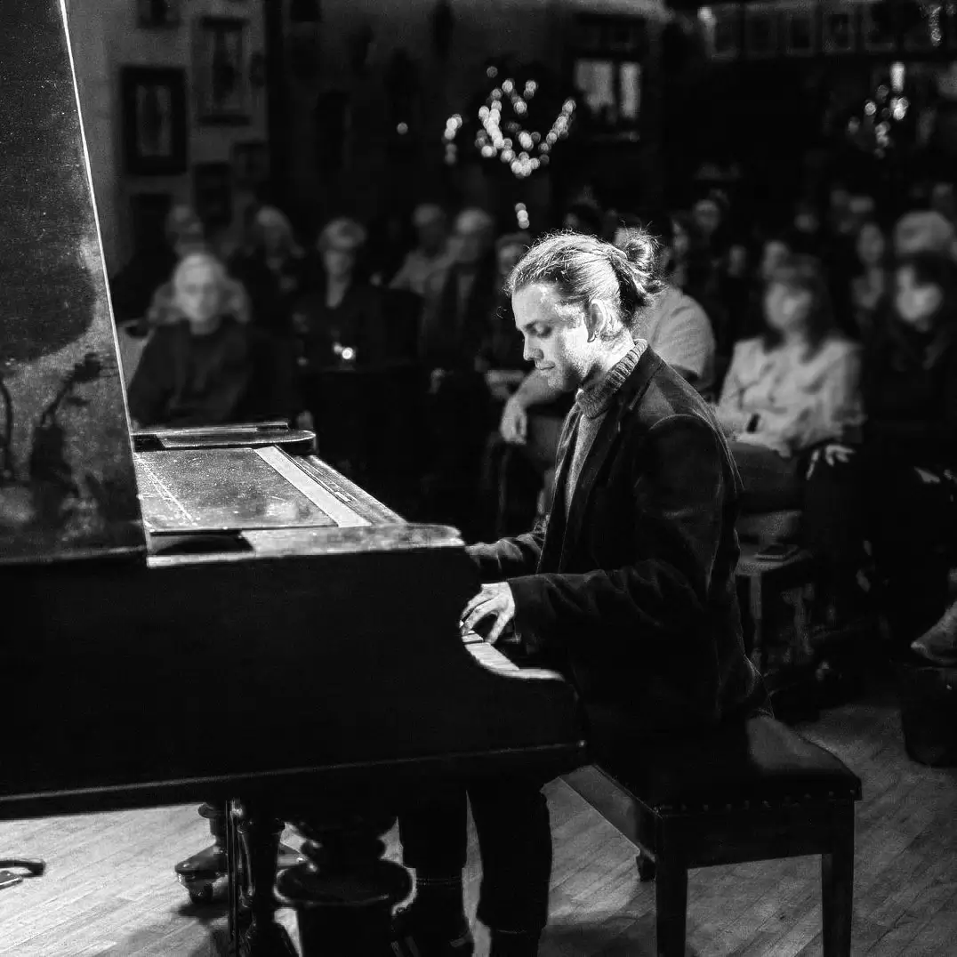 Hugh Vincent at the piano
